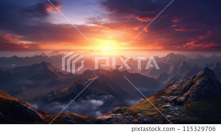 Breathtaking view of vibrant sunrise or sunset over rugged mountain peaks with clouds 115329706
