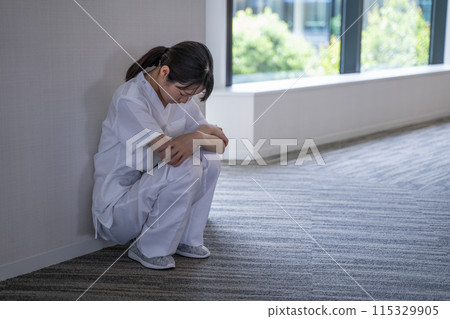 Depressed nurse at the hospital 115329905