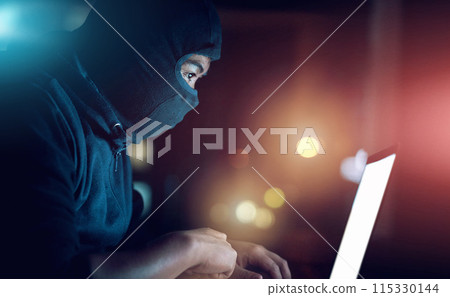 Man, hacker and laptop screen at night as thief with malware for hacking database software, hardware virus or firewall error. Male spy, digital and criminal for phishing, cyber crime or privacy risk 115330144