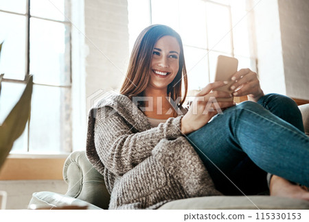 Relax, happy and woman with phone on sofa at home for social media, connectivity and notification. Smile, person and tech with internet in living room for network, communication and online dating app Relax, happy and woman with phone on sofa at home for social media, connectivity and notification. Smile, person and tech with internet in living room for network, communication and online dating app 115330153