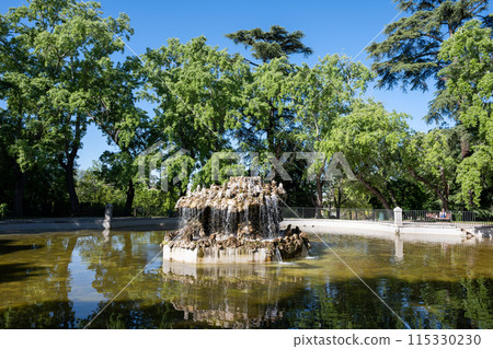 Fountain in Basin of Bells, Estanque de Campanillas, in Retiro Park in Madrid. Fountain in Basin of Bells, Estanque de Campanillas, in Retiro Park in Madrid. 115330230