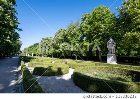 Walk of Statues in El Retiro Park in Madrid, Spain on sunny April morning. 115330232
