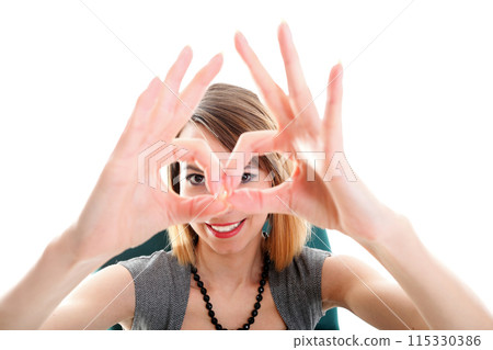 Business woman showing ok sign isolated Business woman showing ok sign isolated 115330386