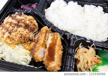 Delicious pork fillet and minced meat cutlet bento 115330393