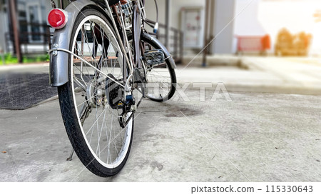 Close up parts of traditional dark brown bicycle Close up parts of traditional dark brown bicycle 115330643