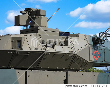 Japan Ground Self-Defense Force Type 16 Mobile Combat Vehicle Fires Smoke Grenades 115331281
