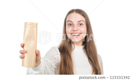 happy kid presenting shampoo or hair body conditioner bottle isolated on white, beauty 115331342