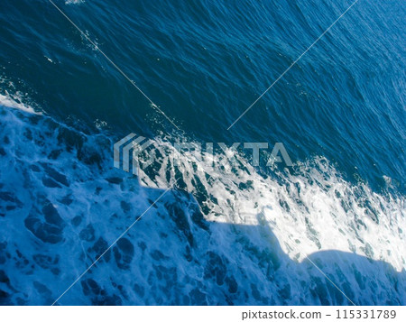 Ferry Rebun Island to Wakkanai (Shadow of the ferry reflected on the white waves) 115331789