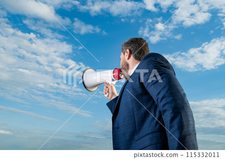 businessman shout in bullhorn on sky background 115332011