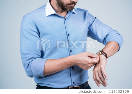 cropped man checking time. wristwatch on male hand of ceo. you are late. deadline. time management. 115332599