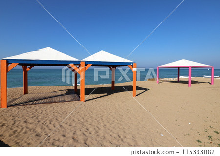 Sun canopy in a city park on the seashore. Sun canopy in a city park on the seashore. 115333082