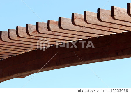 Sun canopy in a city park on the seashore. Sun canopy in a city park on the seashore. 115333088