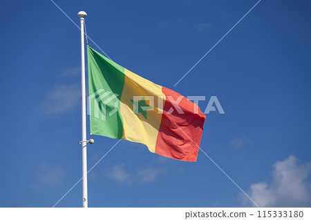 Senegalese flag waving atop of its pole Senegalese flag waving atop of its pole 115333180