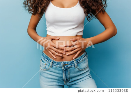 Pregnant Woman in a White Shirt Pregnant Woman in a White Shirt 115333988