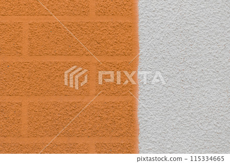 Brown plaster wall two colors with abstract brick pattern and white stucco background texture 115334665
