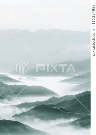 minimalist landscape photograph of rolling hills shrouded in morning mist. The soft, ethereal light adds a sense of peace and tranquility to the scene. 115334982