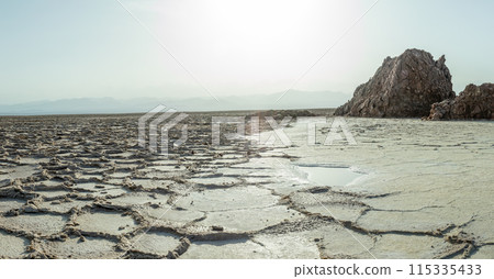 Karum white salt lake surface, Danakil Depression desert, Afar region, Ethiopia Karum white salt lake surface, Danakil Depression desert, Afar region, Ethiopia 115335433