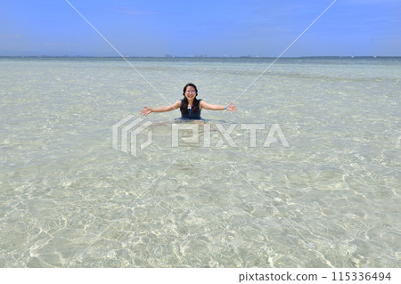 Girls playing on the beach (Nalusuan Island, Philippines) Girls playing on the beach (Nalusuan Island, Philippines) 115336494