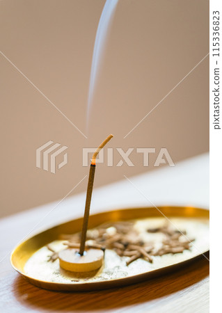 Relax with the scent of incense Relax with the scent of incense 115336823