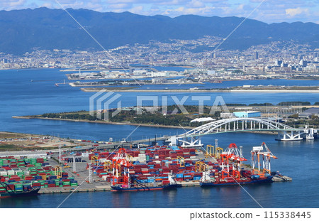 View of Osaka South Port from a high-rise building observation deck: Access to Yumeshima and Yumeshima Bridge 115338445