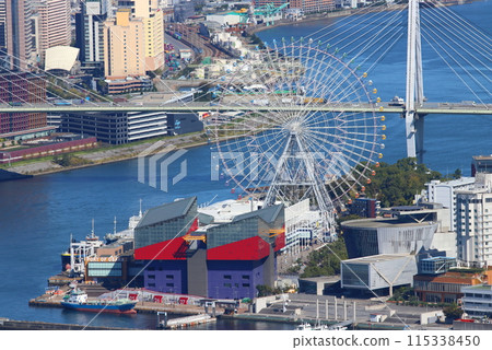View of Osaka South Port from a high-rise building observation deck: Close-up of Tempozan's Ferris Wheel and Kaiyukan Aquarium 115338450