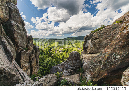 Panoramic view from high rocks in the Carpathian mountains, Tustan fortress. Panoramic view from high rocks in the Carpathian mountains, Tustan fortress. 115339425