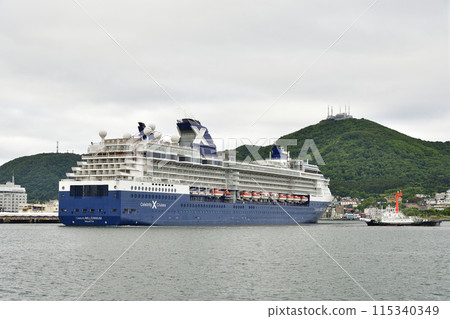 Photographing the cruise ship Celebrity Millennium entering Hakodate Port in Hakodate, Hokkaido in early summer 115340349
