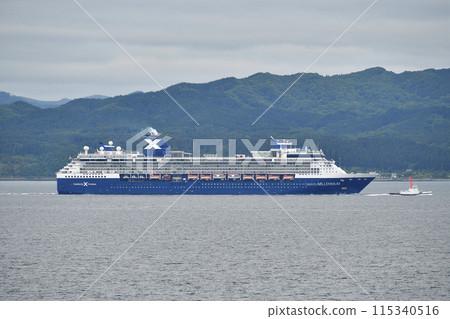 Photographing the cruise ship Celebrity Millennium sailing through Hakodate Bay in Hakodate, Hokkaido in early summer Photographing the cruise ship Celebrity Millennium sailing through Hakodate Bay in Hakodate, Hokkaido in early summer 115340516