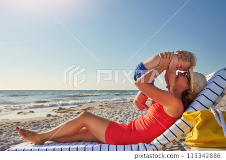 Woman, lifting and boy on beach with love on holiday, vacation in Istanbul for happiness or memory. Excited, mom and child for relax, together and bonding in play for growth, development or playing Woman, lifting and boy on beach with love on holiday, vacation in Istanbul for happiness or memory. Excited, mom and child for relax, together and bonding in play for growth, development or playing 115342886