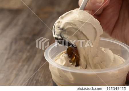 Coffee jelly in a spoon-shaped cup container Coffee jelly in a spoon-shaped cup container 115343455
