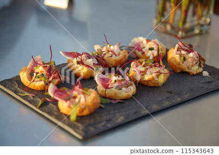 Elegant Gourmet Hors doeuvres on a Slate Platter, perfect for special occasions Elegant Gourmet Hors doeuvres on a Slate Platter, perfect for special occasions 115343643