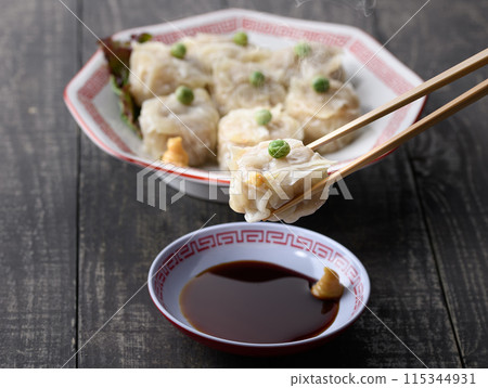 Steamed dish: Dip shumai in sauce 115344931