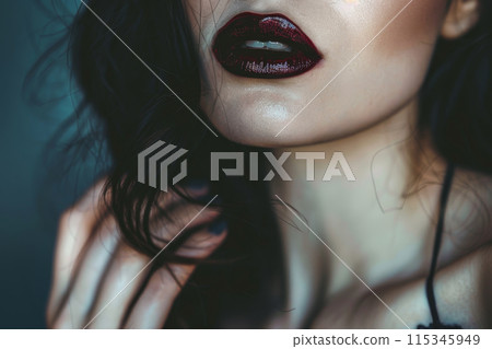A woman with long dark hair and red lipstick A woman with long dark hair and red lipstick 115345949