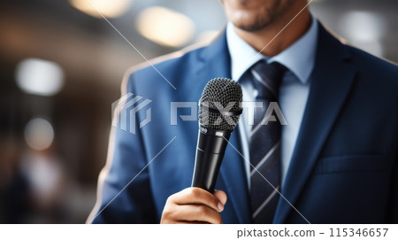 A journalist with a microphone, exploring stories, conducting interviews, and amplifying diverse perspectives through the power of audio storytelling in the dynamic world of media. A journalist with a microphone, exploring stories, conducting interviews, and amplifying diverse perspectives through the power of audio storytelling in the dynamic world of media. 115346657