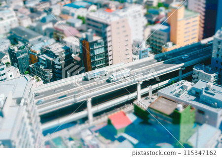 Aerial view of a line of cars on a highway Aerial view of a line of cars on a highway 115347162