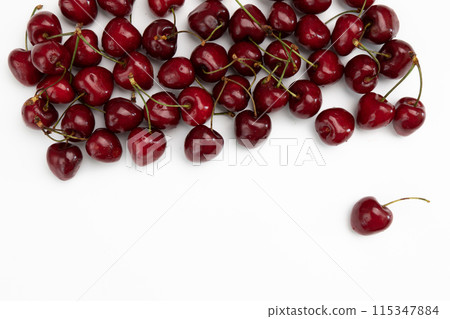 pile of cherries isolated on white background, top view pile of cherries isolated on white background, top view 115347884