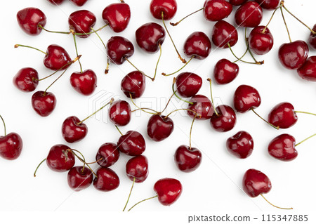 pile of ripe cherries isolated on white background pile of ripe cherries isolated on white background 115347885