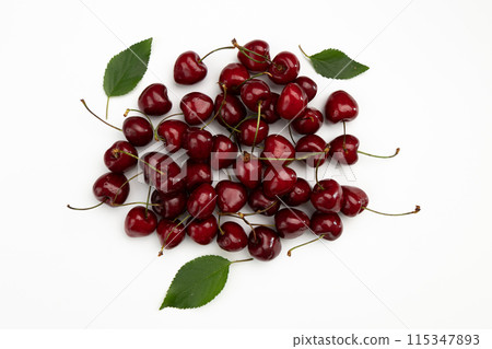 pile of cherries isolated on white background, top view 115347893