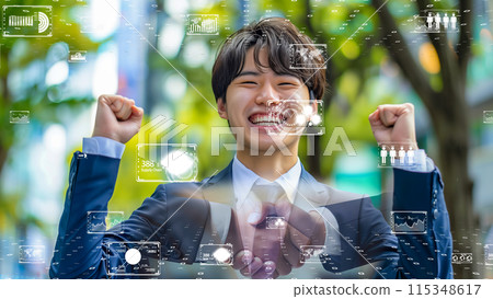Cheerful business people celebrating success with digital data 115348617