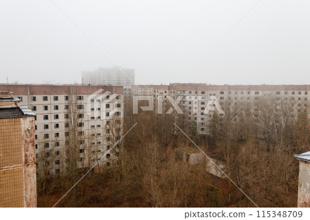 View of ghost town Pripyat at autumn in Chernobyl Exclusion Zone, Ukraine. View from above View of ghost town Pripyat at autumn in Chernobyl Exclusion Zone, Ukraine. View from above 115348709