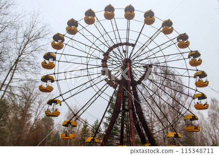 Abandoned Ferris Wheel in the amusement park of ghost town Pripyat in Chernobyl Exclusion Zone, Ukraine Abandoned Ferris Wheel in the amusement park of ghost town Pripyat in Chernobyl Exclusion Zone, Ukraine 115348711