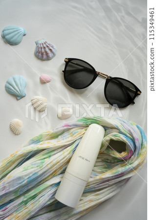 Summer sunglasses and sunscreen Summer sunglasses and sunscreen 115349461