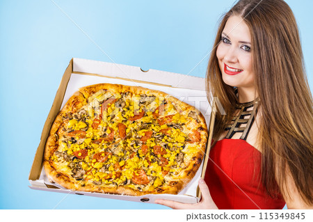 Woman holding big pizza in box 115349845