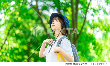 Young woman enjoying trekking in nature 115349903