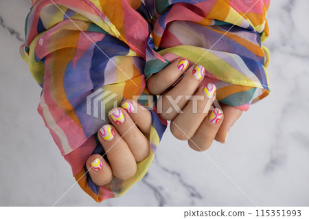 Woman manicured hands, stylish summer colorful nails. Closeup of manicured nails of female hand. Summer style of nail design concept. Beauty 115351993