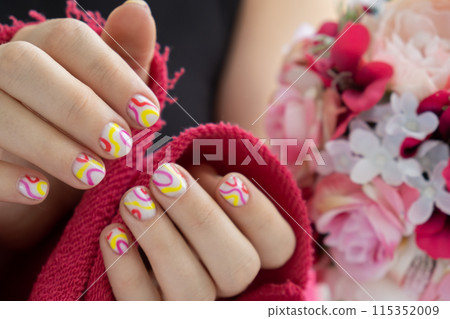 Stylish colorful summer female nails. Modern trendy stylish Beautiful manicure. Cute pastel nail minimalistic design concept of beauty treatment. Gel nails. Skin care 115352009