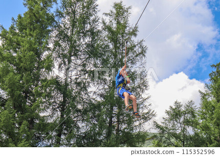 Tree trekking, tree walking, zip lining at Niseko Village in Niseko, Hokkaido Tree trekking, tree walking, zip lining at Niseko Village in Niseko, Hokkaido 115352596