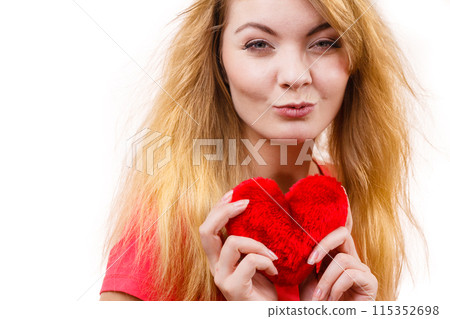 Woman blonde girl holding red heart love symbol 115352698