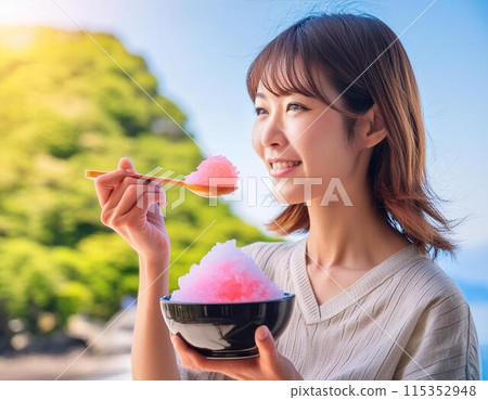 A woman eating shaved ice in hot summer A woman eating shaved ice in hot summer 115352948