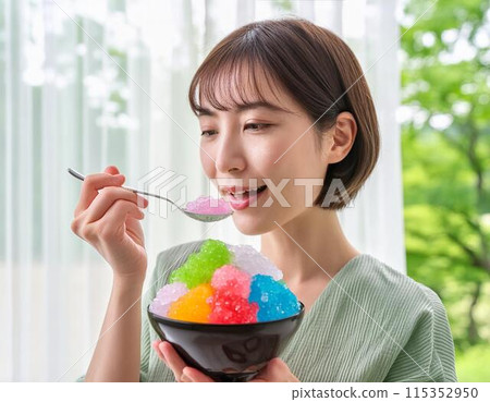A woman eating shaved ice in hot summer A woman eating shaved ice in hot summer 115352950